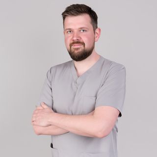 Powiększ obraz: Wojciech Ostrowski, stomatolog Kraków