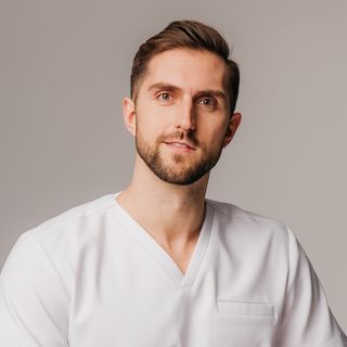 Powiększ obraz: Łukasz Ciastoń, ginekolog Suchy Las