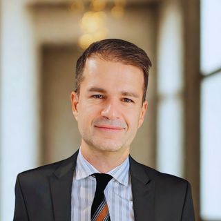 Dr. Alberto Migliore