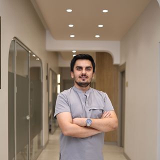 Mehmet Özçelik, Diş Hekimi İzmit