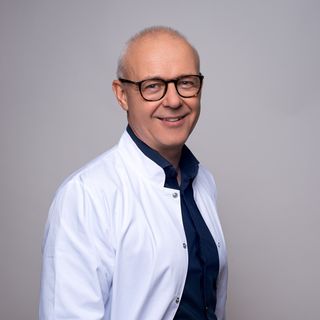 Powiększ obraz: Arkadiusz Pogrzebielski, okulista Kraków