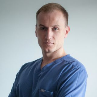 Powiększ obraz: Adam Hydzik, chirurg naczyniowy Kraków